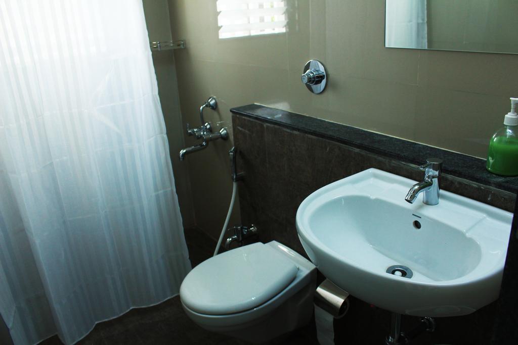 Aashiyana Inn ナーシク 部屋 写真